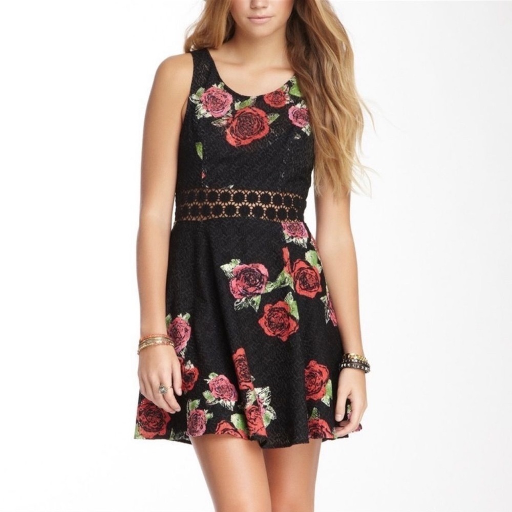 FREE PEOPLE BLACK ROSE DAISY CUTOUT DRESS.